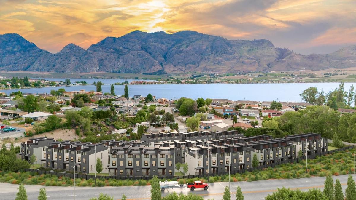 A 3D rendering of a new townhouse development on a hillside above a lake
