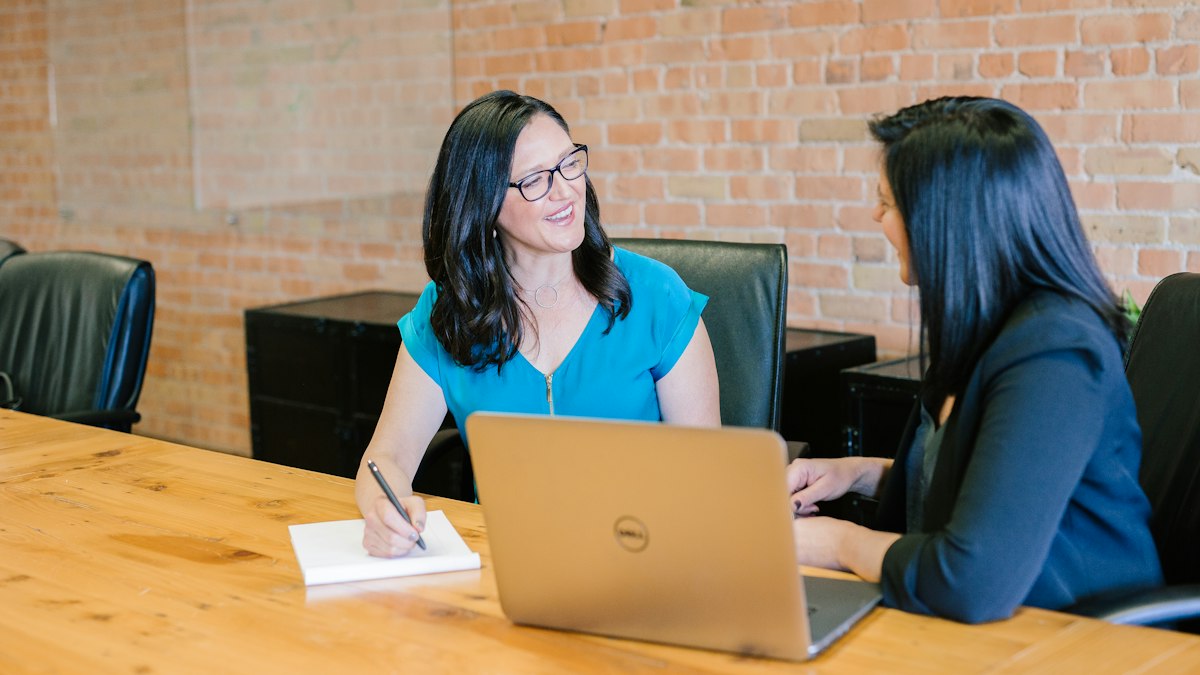 A business owner meeting with an adviser