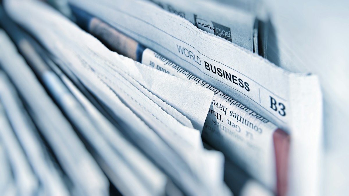 A close-up of a business newspaper page